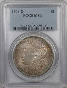 1904-O Morgan Silver Dollar Coin PCGS MS-64 Uncirculated Toned: 1904-O Morgan Silver Dollar Coin PCGS MS-64 Uncirculated Toned This 1904-O Morgan Silver Dollar is a stunning example of American coinage, graded MS-64 by PCGS. Struck in 1904 at the New Orleans Mint,