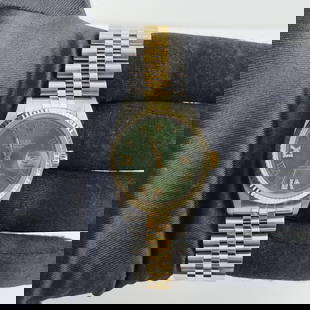 Rolex Datejust Ref 16013 AM Green Roman Dial Jubilee Bracelet: Rolex Datejust Ref 16013 AM Green Roman Dial Jubilee Bracelet This Rolex Datejust features a striking AM Green Roman dial complemented by a fluted bezel. The watch is designed for men and includes a J