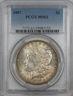 1887 Morgan Silver Dollar PCGS MS 63 Uncirculated Toned Coin: 1887 Morgan Silver Dollar PCGS MS 63 Uncirculated Toned Coin This 1887 Morgan Silver Dollar is a stunning example of the iconic coin, certified by PCGS with a grade of MS 63. This uncirculated coin fe