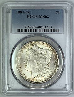 1884-CC Morgan Silver Dollar Coin PCGS MS 62 Uncirculated: 1884-CC Morgan Silver Dollar Coin PCGS MS 62 Uncirculated This 1884-CC Morgan Silver Dollar Coin is a stunning example of American numismatic history. Graded as MS 62 by PCGS, this uncirculated coin f