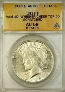 1923 Peace Silver Dollar Coin ANACS AU-58 Whisker Cheek Top 50: 1923 Peace Silver Dollar Coin ANACS AU-58 Whisker Cheek Top 50 This 1923 VAM-1D Peace Silver Dollar Coin is certified by ANACS with a grade of AU 58. Made of silver, it features the iconic Peace Dolla