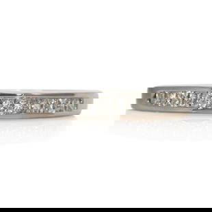 Elegant 14K White Gold 11 Diamond Princess Cut Band Size 7: Elegant 14K White Gold 11 Diamond Princess Cut Band Size 7 This stunning 14K White Gold Diamond Band features 11 channel set princess cut diamonds with a total carat weight of 0.22 ct. The diamonds ar
