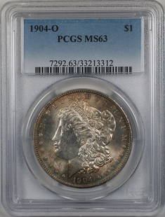 1904-O Morgan Silver Dollar Coin PCGS MS 63 Toned Uncirculated: 1904-O Morgan Silver Dollar Coin PCGS MS 63 Toned Uncirculated This 1904-O Morgan Silver Dollar is a stunning collectible coin graded MS 63 by PCGS. Struck in 1904 at the New Orleans Mint, this uncirc