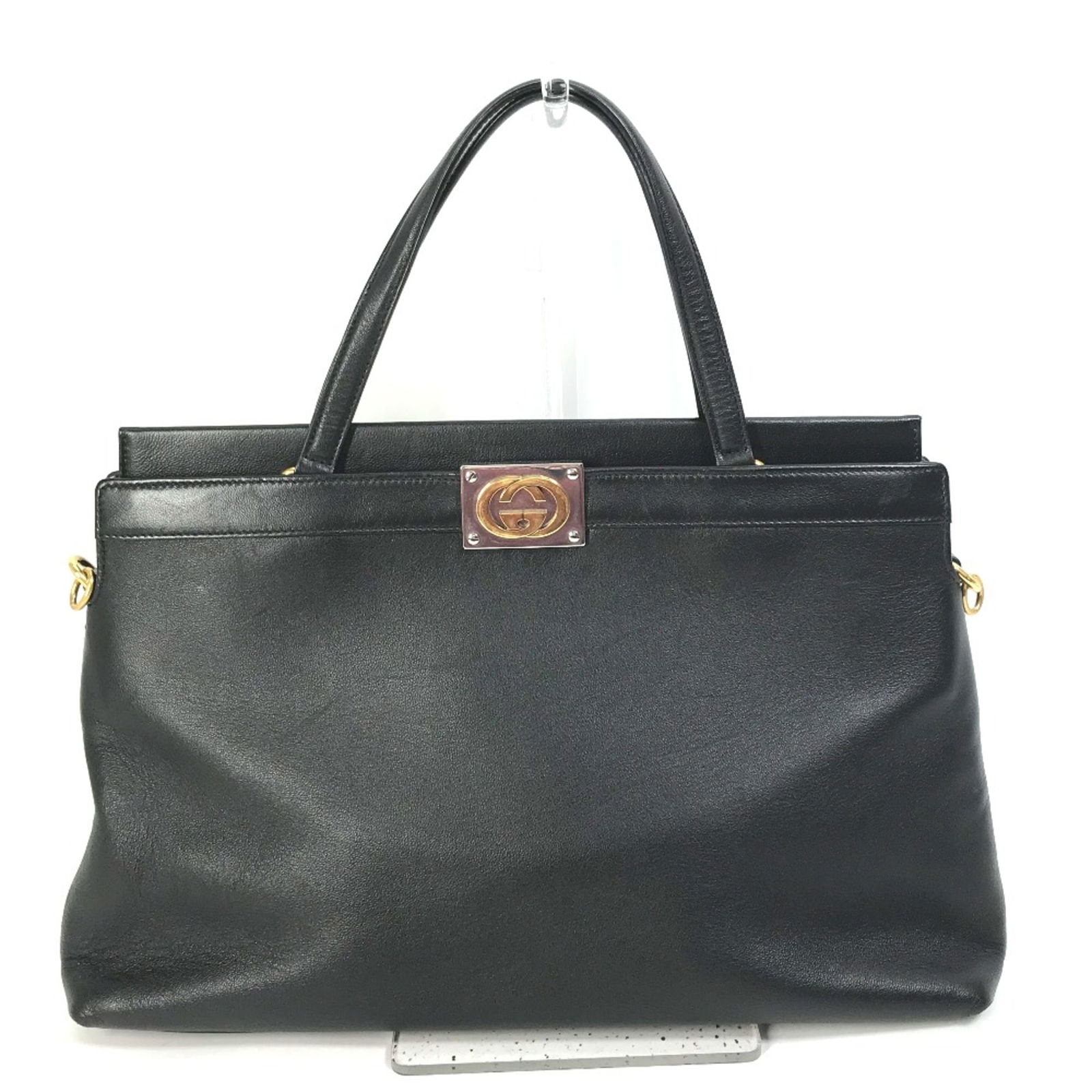 Gucci 630595 Black Leather Tote Bag 23cm x 33cm x 9.5cm: Gucci 630595 Black Leather Tote Bag 23cm x 33cm x 9.5cm This stylish Gucci 630595 Tote Bag is a must-have for any fashion-forward woman. Crafted from high-quality leather, this handbag features a slee