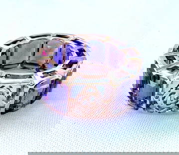 Piranesi 18K Rose Gold Amethyst Ring 20 ct Size 6: Piranesi 18K Rose Gold Amethyst Ring 20 ct Size 6 This exquisite Italian ring features a stunning 18K rose gold setting, showcasing a magnificent emerald cut amethyst that weighs approximately 20 ct.