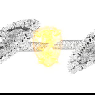 1.78ctt Fancy Yellow Pear Diamond Halo Ring 18k: 1.78ctt Fancy Yellow Pear Diamond Halo Ring 18k This exquisite ring features a stunning 1.78ctt Fancy Yellow Pear Diamond at its center, enhanced by a halo of 31 round brilliant diamonds totaling 0.54