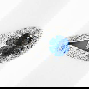 Vintage Platinum 1.71ct Blue Sapphire & Diamond Cocktail Ring Retro Era: Vintage Platinum 1.71ct Blue Sapphire & Diamond Cocktail Ring Retro Era This exquisite vintage cocktail ring features a stunning natural blue sapphire, weighing 1.71 ct, set in a luxurious platinum ba