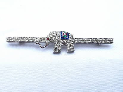 French Art Deco 18K White Gold Elephant Brooch with Diamonds Rubies Emeralds: French Art Deco 18K White Gold Elephant Brooch with Diamonds Rubies Emeralds Experience the elegance of this French Art Deco brooch, meticulously crafted in 18K white gold. This stunning piece feature