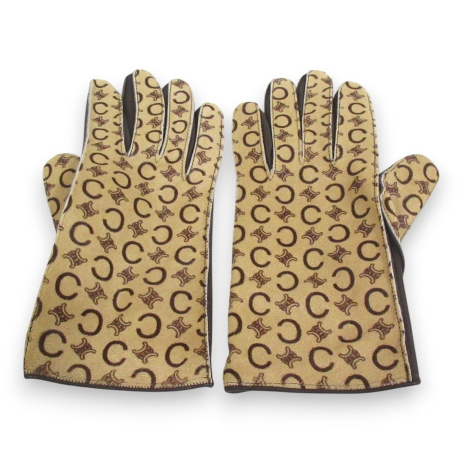 Celine Women's Beige Brown Harako Leather Gloves 9.25 In: Celine Women's Beige Brown Harako Leather Gloves 9.25 In Elevate your style with these exquisite women's gloves by Celine, featuring a sophisticated blend of beige and brown hues. Crafted from high-qu