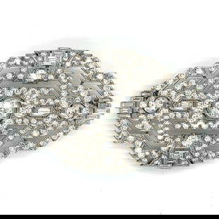 Vintage Art Deco Platinum Diamond Brooch 13.30 Ct 2.75 Inches: Vintage Art Deco Platinum Diamond Brooch 13.30 Ct 2.75 Inches Discover the elegance of this Art Deco Platinum brooch, featuring a stunning total diamond weight of 13.30 ct. At its center, a captivatin