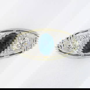 Handmade Art Deco 18K Gold Platinum Sapphire Diamond Three-Stone Ring: Handmade Art Deco 18K Gold Platinum Sapphire Diamond Three-Stone Ring This exquisite Antique Art Deco ring features a stunning three-stone design, showcasing vibrant sapphires alongside sparkling diam