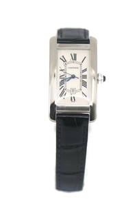 Cartier Tank Americaine 18K White Gold Midsize Watch 1726 with Box and Papers: Cartier Tank Americaine 18K White Gold Midsize Watch 1726 with Box and Papers Experience the elegance of the Cartier Tank Americaine Midsize watch, a stunning blend of luxury and craftsmanship. This e