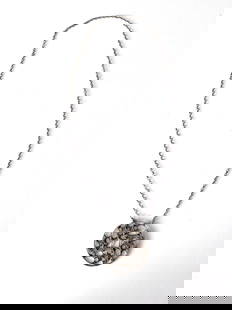 Vintage Modernist Silver Tone Pendant Necklace 31 in 2.5 in: Vintage Modernist Silver Tone Pendant Necklace 31 in 2.5 in This vintage modernist pendant necklace showcases a striking design with a large silver tone pendant. The necklace is crafted with a slip-on