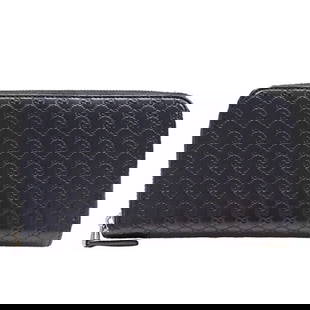 Gucci Black Leather Long Wallet Micro GG 544473 for Men and Women: Gucci Black Leather Long Wallet Micro GG 544473 for Men and Women This Gucci long wallet, crafted from high-quality leather, features the iconic Micro GG design in sophisticated black. Designed for bo