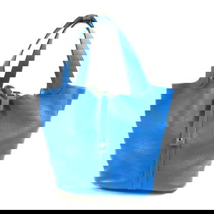 HERMES Picotin MM Tote Bag Clemence Leather Bleu Hydra: HERMES Picotin MM Tote Bag Clemence Leather Bleu Hydra Discover the elegance of the HERMES Picotin MM Handbag Tote, crafted from premium Clemence leather. This stylish tote features a beautiful Bleu H