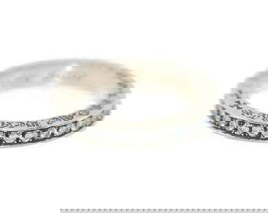 Chrome Hearts Authentic Sterling Silver Ring with Cubic Zirconia 9.5: Chrome Hearts Authentic Sterling Silver Ring with Cubic Zirconia 9.5 This exquisite Chrome Hearts ring is crafted from sterling silver and features a stunning cubic zirconia stone. With a ring size of