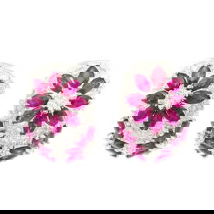 Omega 18K White Gold Floral Cuff Earrings 4.10ctw Ruby Diamond: Omega 18K White Gold Floral Cuff Earrings 4.10ctw Ruby Diamond These stunning cuff earrings feature a floral design crafted from solid 18k white gold. The earrings showcase a vibrant natural ruby in a