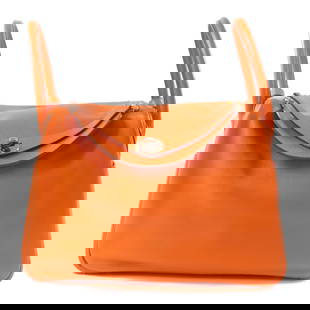 HERMES Lindy 30 2 Way Bag Evercolor Leather Orange Poppy: HERMES Lindy 30 2 Way Bag Evercolor Leather Orange Poppy Introducing the HERMES Lindy 30 2 Way Bag, crafted from high-quality calfskin leather in a vibrant Orange Poppy hue. This stylish shoulder bag
