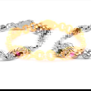 Elegant 18k Yellow Gold Diamond Ruby Fancy Link Bracelet: Elegant 18k Yellow Gold Diamond Ruby Fancy Link Bracelet This exquisite fancy link bracelet is expertly crafted from 18k yellow gold, showcasing a polished finish. It features five oval links, each ad