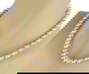 Tiffany & Co. 18k White Gold Pearl Necklace Signature Design 16 Inch: Tiffany & Co. 18k White Gold Pearl Necklace Signature Design 16 Inch Crafted by Tiffany & Co., this Signature 18k White Gold Pearl Necklace epitomizes classic elegance and sophistication. The necklace