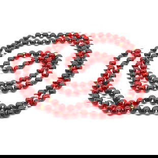 14k Yellow Gold Carnelian 36 Inch Beaded Necklace: 14k Yellow Gold Carnelian 36 Inch Beaded Necklace This exquisite 36" long strung bead necklace features vibrant round red Carnelian stones elegantly interspersed with luxurious 14k yellow gold accents