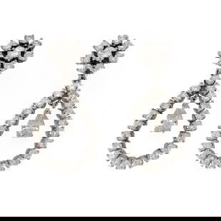 14k White Gold Diamond Drop Earrings Pear Shape Floral Design: 14k White Gold Diamond Drop Earrings Pear Shape Floral Design Elevate your elegance with this stunning pair of Diamond Earrings crafted from 14k white gold. These earrings feature a floral stud top ad