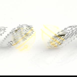 Tiffany & Co. Cupid's Arrow Heart Earrings Sterling Silver 18k Gold Clip-On: Tiffany & Co. Cupid's Arrow Heart Earrings Sterling Silver 18k Gold Clip-On This exquisite pair of clip-on earrings from Tiffany & Co. features a charming design from the Cupid's Arrow Heart collectio