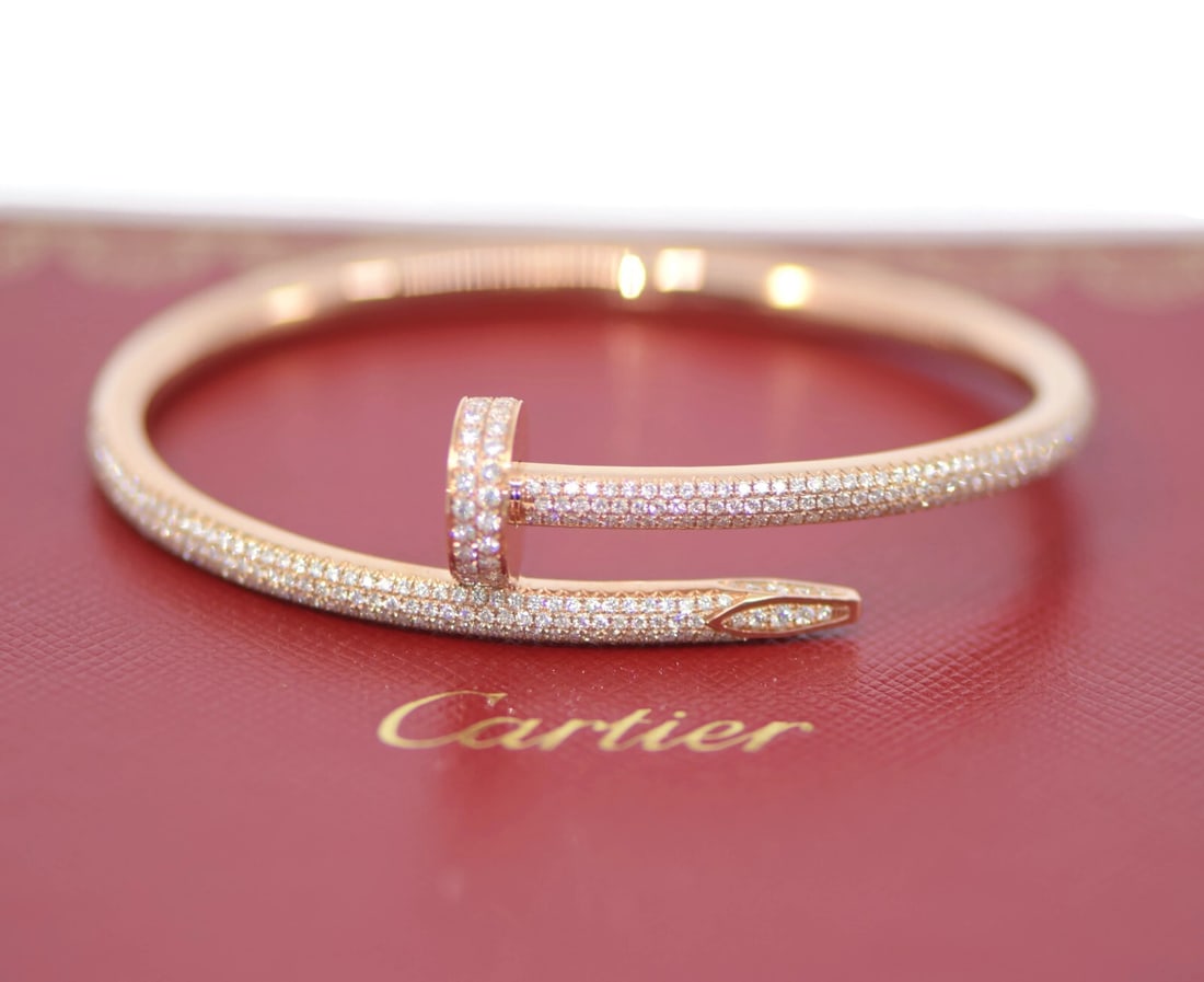 Cartier Juste Un Clou Diamond Bangle 18K Rose Gold Bracelet Certified Authentic: Cartier Juste Un Clou Diamond Bangle 18K Rose Gold Bracelet Certified Authentic This exquisite Cartier Juste Un Clou bracelet features a stunning design crafted from 18K rose gold, accentuated with sp