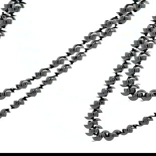 Vintage 32 Inch Hematite Bead Necklace with 14K Yellow Gold Clasp: Vintage 32 Inch Hematite Bead Necklace with 14K Yellow Gold Clasp This stunning vintage necklace features a 32" long strand of natural hematite beads, elegantly layered for a chic look. The necklace i