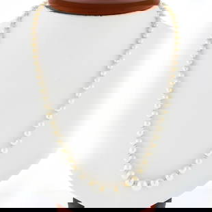 Vintage 14k Yellow Gold Filigree Clasp Pearl Strand Necklace: Vintage 14k Yellow Gold Filigree Clasp Pearl Strand Necklace This exquisite vintage necklace features a stunning strand of 77 graduating white cultured pearls, each measuring between 4.25 mm and 7.5 m