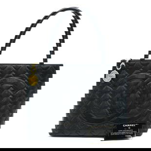 Chanel Black Caviar Leather Tote Bag A01804 with Authenticity Card: Chanel Black Caviar Leather Tote Bag A01804 with Authenticity Card This elegant CHANEL tote bag is crafted from luxurious caviar leather in a classic black hue, making it a versatile addition to any w