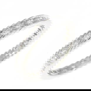 Cartier 18K White Gold Women's Wedding Ring with Diamond: Cartier 18K White Gold Women's Wedding Ring with Diamond This exquisite Cartier wedding ring is crafted from 18K white gold and adorned with a sparkling diamond. Designed specifically for women, it fe