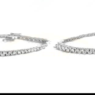 14K White Gold Diamond Tennis Bracelet 6.40 Ct F-G VS1-VS2: 14K White Gold Diamond Tennis Bracelet 6.40 Ct F-G VS1-VS2 This exquisite 14K White Gold Tennis Bracelet features a stunning arrangement of 53 diamonds, with a total weight of approximately 6.40 ct. T