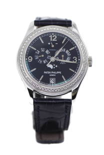 Patek Philippe 5147G Annual Calendar 18K White Gold Tiffany Watch: Patek Philippe 5147G Annual Calendar 18K White Gold Tiffany Watch Discover the elegance of the Patek Philippe Annual Calendar 5147G, a luxurious wristwatch crafted in 18K white gold. This exceptional