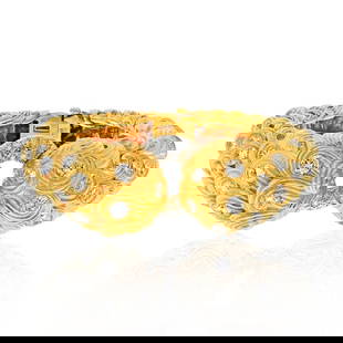 David Webb 21 Carat Platinum Gold Scroll Diamond Bangle Bracelet: David Webb 21 Carat Platinum Gold Scroll Diamond Bangle Bracelet This exquisite David Webb bracelet features a stunning combination of platinum and 18K yellow gold, beautifully designed with a scroll