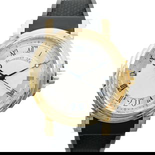 Breguet Marine 2 5817BA Men's 18K Yellow Gold Automatic Wristwatch: Breguet Marine 2 5817BA Men's 18K Yellow Gold Automatic Wristwatch The Breguet Marine 2 5817BA is a luxurious wristwatch designed for men, crafted from 18K yellow gold. This automatic timepiece featur