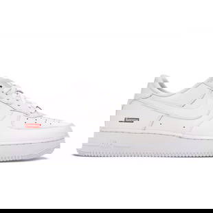 Authentic Nike Air Force 1 Low Supreme White Sneakers: Authentic Nike Air Force 1 Low Supreme White Sneakers Experience the iconic style of the authentic Nike Air Force 1 Low Supreme in a classic white finish. This sneaker is brand new and in unworn condi