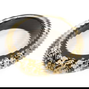 Stylish LOUIS VUITTON Black Gold Bangle: Stylish LOUIS VUITTON Black Gold Bangle A stylish LOUIS VUITTON bangle crafted in a sleek black material, accented with gold elements. This bangle is designed for regular wear and showcases a contempo