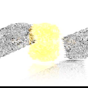 Platinum & 18K Yellow Gold Fancy Yellow Engagement Ring: Platinum & 18K Yellow Gold Fancy Yellow Engagement Ring This exquisite Fancy Yellow Ring features a stunning three-stone design, expertly crafted in a combination of Platinum and 18K Yellow Gold. The