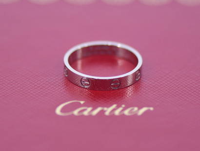 Cartier SM 18K White Gold Love Ring 59 with Service Receipt: Cartier SM 18K White Gold Love Ring 59 with Service Receipt Discover the timeless elegance of the Cartier SM Love Ring, crafted in luxurious 18K white gold. This exquisite piece exemplifies sophistica