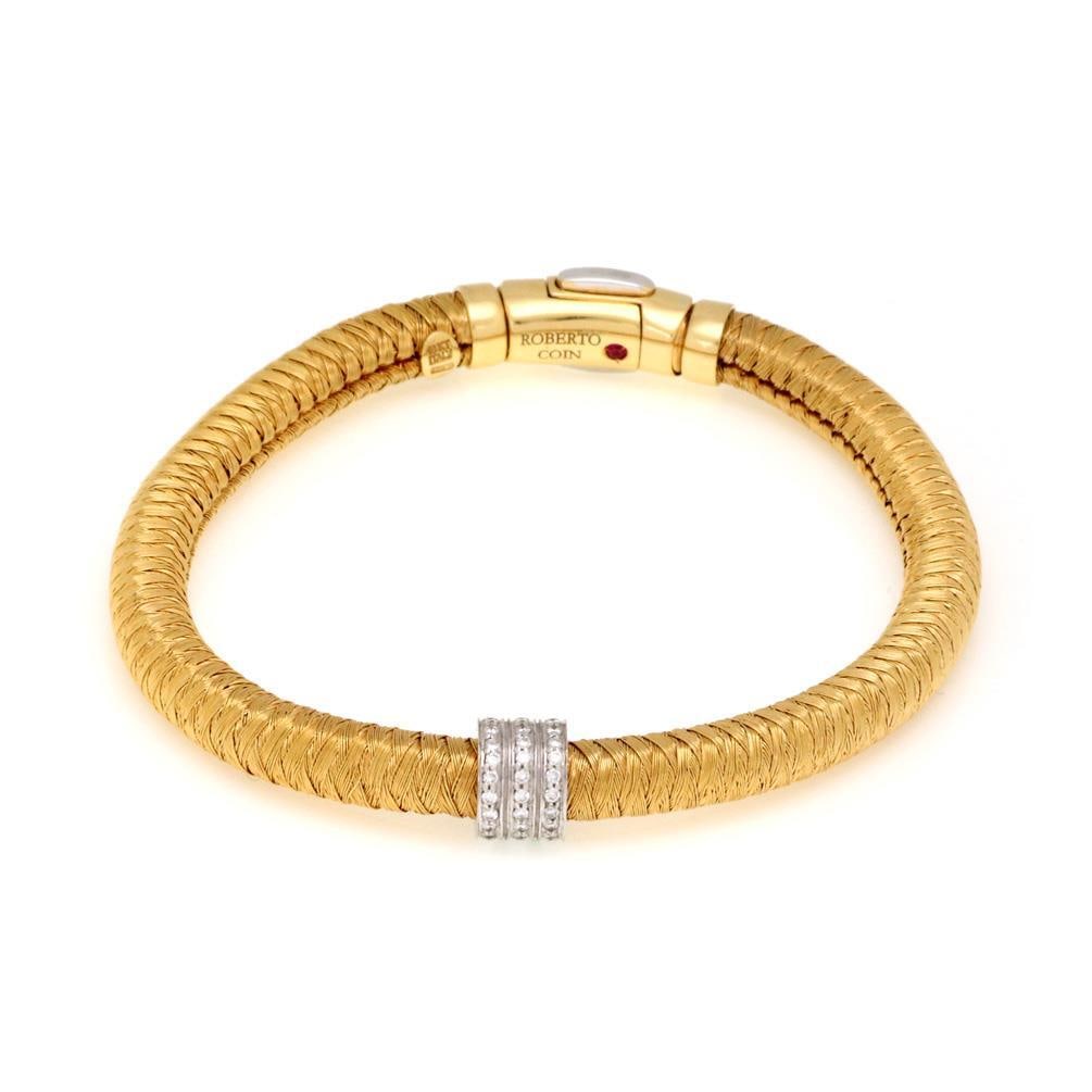 Roberto Coin Primavera 18k Gold Diamond Flex Bracelet: Roberto Coin Primavera 18k Gold Diamond Flex Bracelet Discover the elegance of the Roberto Coin Primavera collection with this exquisite Diamond Flex Bracelet. Crafted from 18k yellow gold, this brace