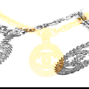 Chanel Gold Plated CC Pendant Necklace France Costume Jewelry: Chanel Gold Plated CC Pendant Necklace France Costume Jewelry Elevate your accessory collection with this stunning Chanel Gold Plated CC Round Pendant Necklace. This exquisite piece features a gold-to
