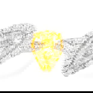 EGL 1.23ct Fancy Yellow Pear Diamond Halo Ring 18k: EGL 1.23ct Fancy Yellow Pear Diamond Halo Ring 18k This exquisite ring features a stunning 1.23 ct Fancy Yellow Pear Diamond, EGL certified, elegantly set in a contemporary two-tone design of 18k yell