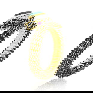 David Webb Snake Bracelet Platinum 18K Yellow Gold Emerald Ruby Diamonds: David Webb Snake Bracelet Platinum 18K Yellow Gold Emerald Ruby Diamonds This exquisite David Webb bracelet is a stunning representation of fine craftsmanship, featuring a snake design elegantly craft
