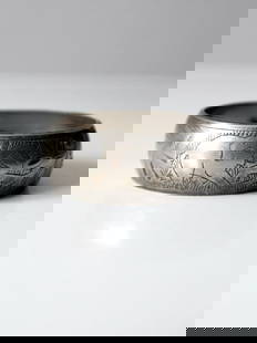 Vintage Silver Tone Etched Elephant Bangle Bracelet 9.5" Circumference: Vintage Silver Tone Etched Elephant Bangle Bracelet 9.5" Circumference This vintage etched bangle bracelet features a wide, chunky design in silver tone, beautifully adorned with an intricate etched e