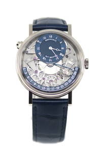 Breguet Tradition Retrograde 18K White Gold Watch Ref 7597 with Box and Papers: Breguet Tradition Retrograde 18K White Gold Watch Ref 7597 with Box and Papers The Breguet Tradition Retrograde wristwatch is a luxurious timepiece crafted from 18K white gold. This exquisite watch fe