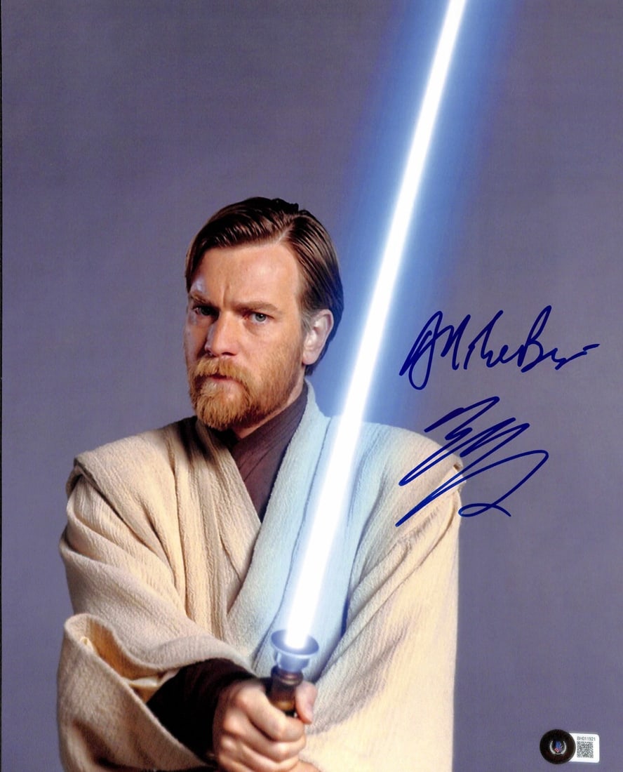 Ewan McGregor Signed 11x14 Obi Wan Photo Star Wars Beckett Certified: Ewan McGregor Signed 11x14 Obi Wan Photo Star Wars Beckett Certified This is a stunning 11x14 photograph featuring Ewan McGregor as Obi Wan Kenobi in Star Wars: Attack of the Clones. The photograph ha