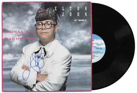 Elton John Signed Mona Lisas And Mad Hatters Album Cover With Vinyl Beckett COA: Elton John Signed Mona Lisas And Mad Hatters Album Cover With Vinyl Beckett COA This signed album cover of "Mona Lisas And Mad Hatters" by Elton John is a must-have for any music enthusiast. The cover