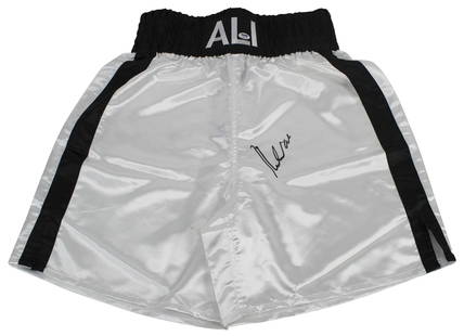 Muhammad Ali Signed White Boxing Trunks PSA/DNA Certified Authentic: Muhammad Ali Signed White Boxing Trunks PSA/DNA Certified Authentic This authentic pair of boxing trunks, personally signed by the legendary Muhammad Ali, is a must-have for any boxing enthusiast or c