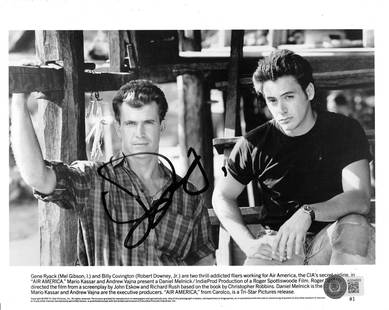 Robert Downey Jr. Air America Signed 8x10 B&W Photo with Beckett COA: Robert Downey Jr. Air America Signed 8x10 B&W Photo with Beckett COA This authentic autographed black and white 8x10 photograph features Robert Downey Jr. in his role from the film 'Air America.' The